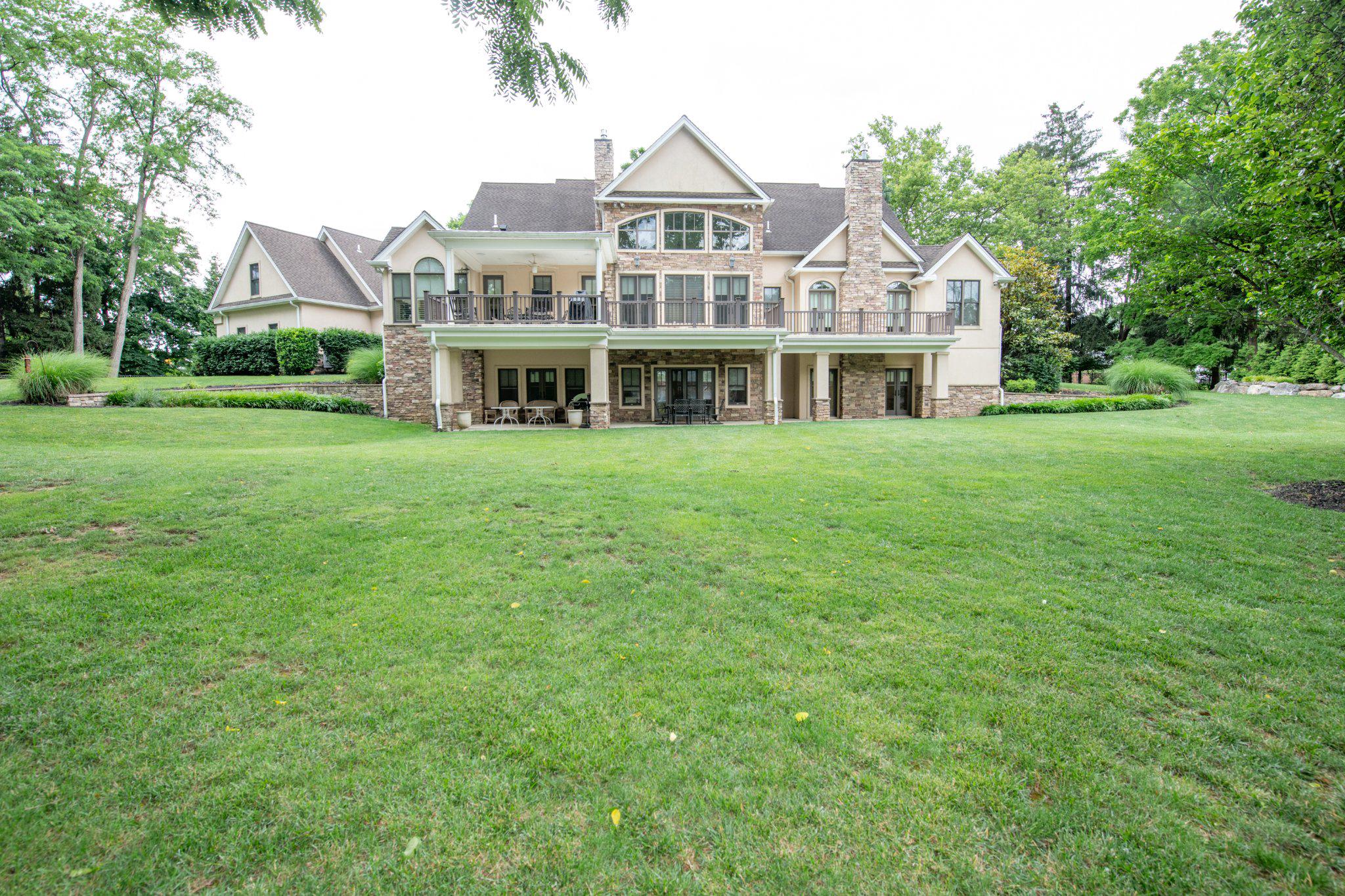 711 Moredon Road Jenkintown, PA 19046 - Photo 10 of 140 Rear view of Estate with lush green lawn.