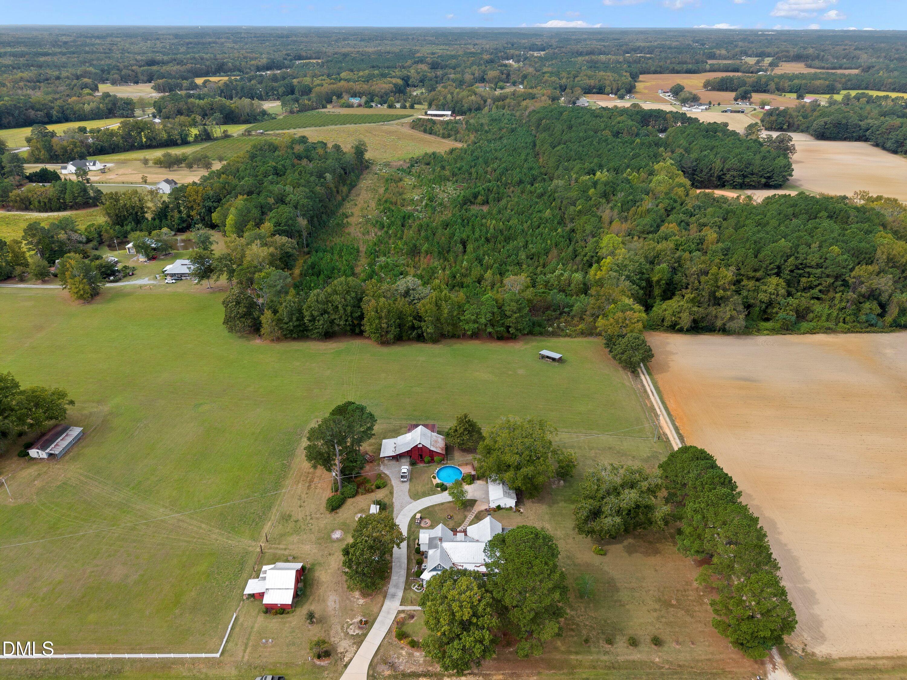 89 Bailey-Boykin Road Selma, NC 27576 - Photo 2 of 48 an aerial view of a houses with a lake view
