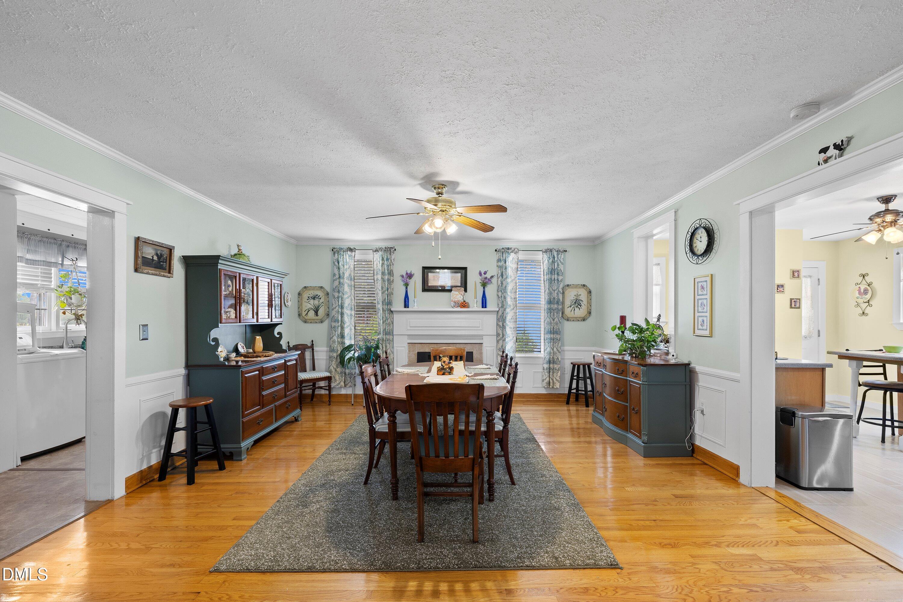 89 Bailey-Boykin Road Selma, NC 27576 - Photo 21 of 48 a dining room with wooden floor and stainless steel appliances