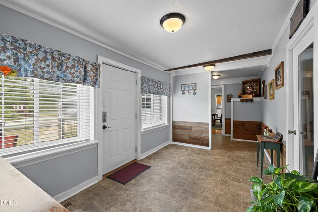 a livingroom with furniture and a window