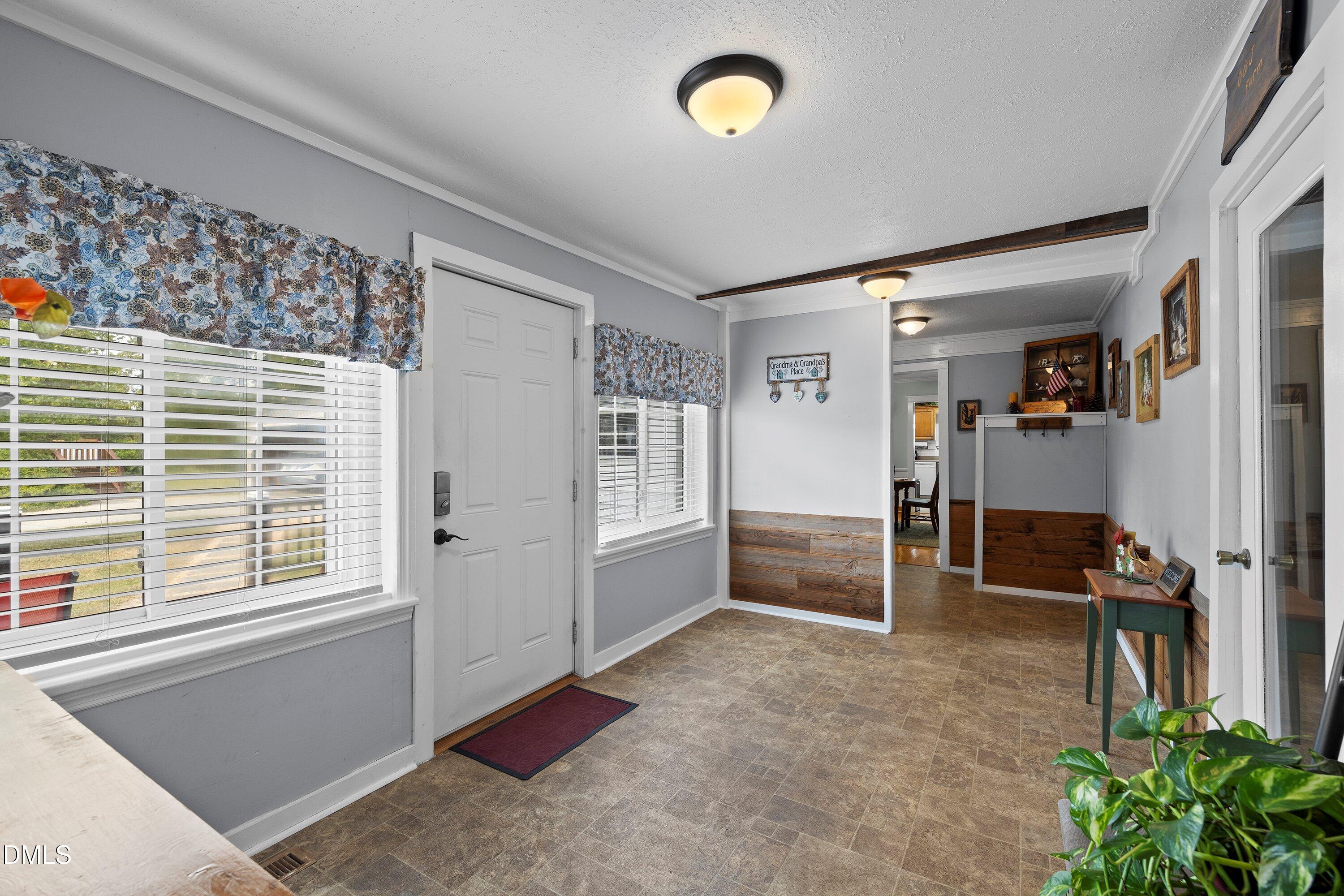 89 Bailey-Boykin Road Selma, NC 27576 - Photo 24 of 48 a livingroom with furniture and a window