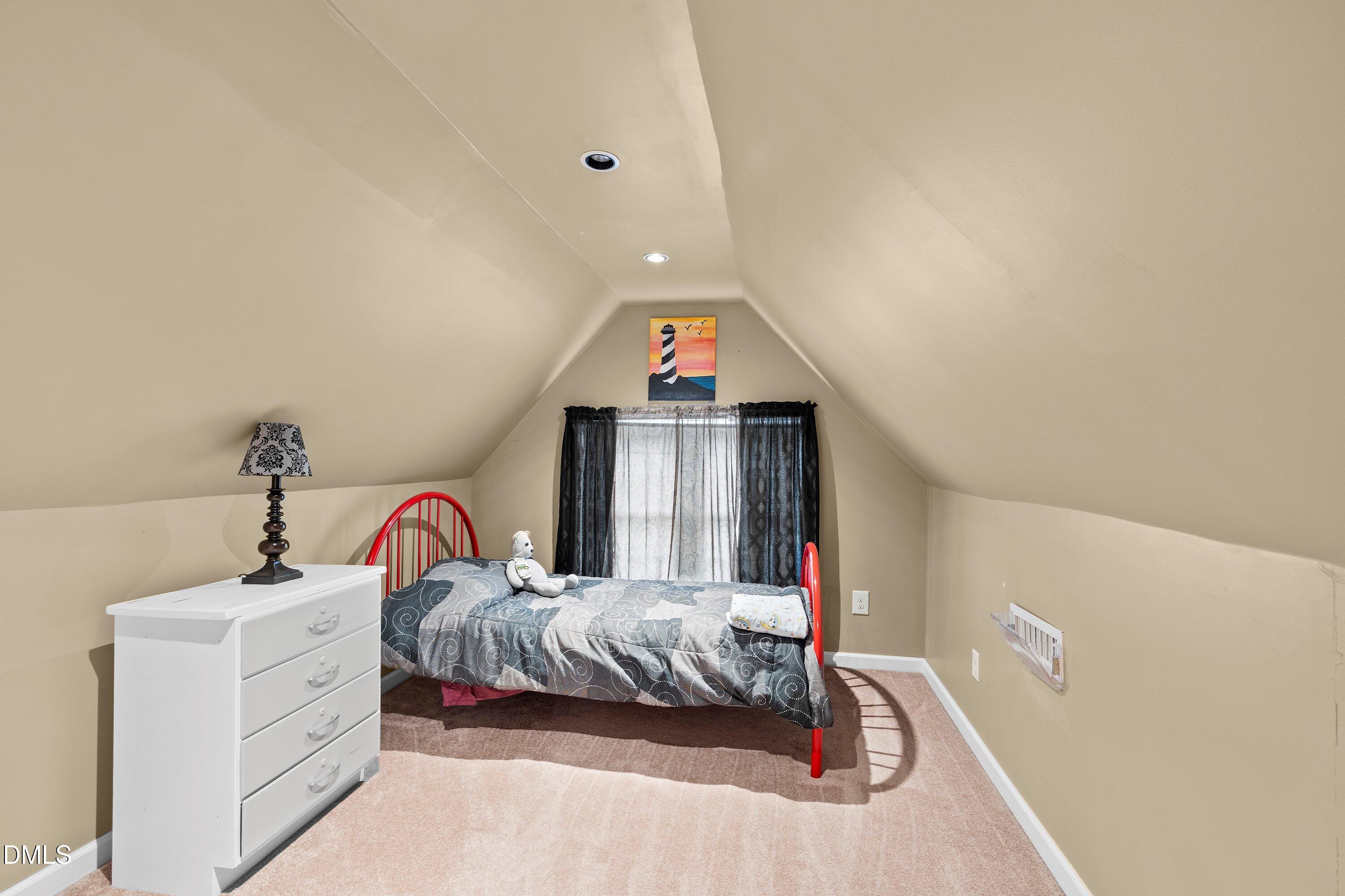 89 Bailey-Boykin Road Selma, NC 27576 - Photo 32 of 48 a bedroom with a bed and a dresser