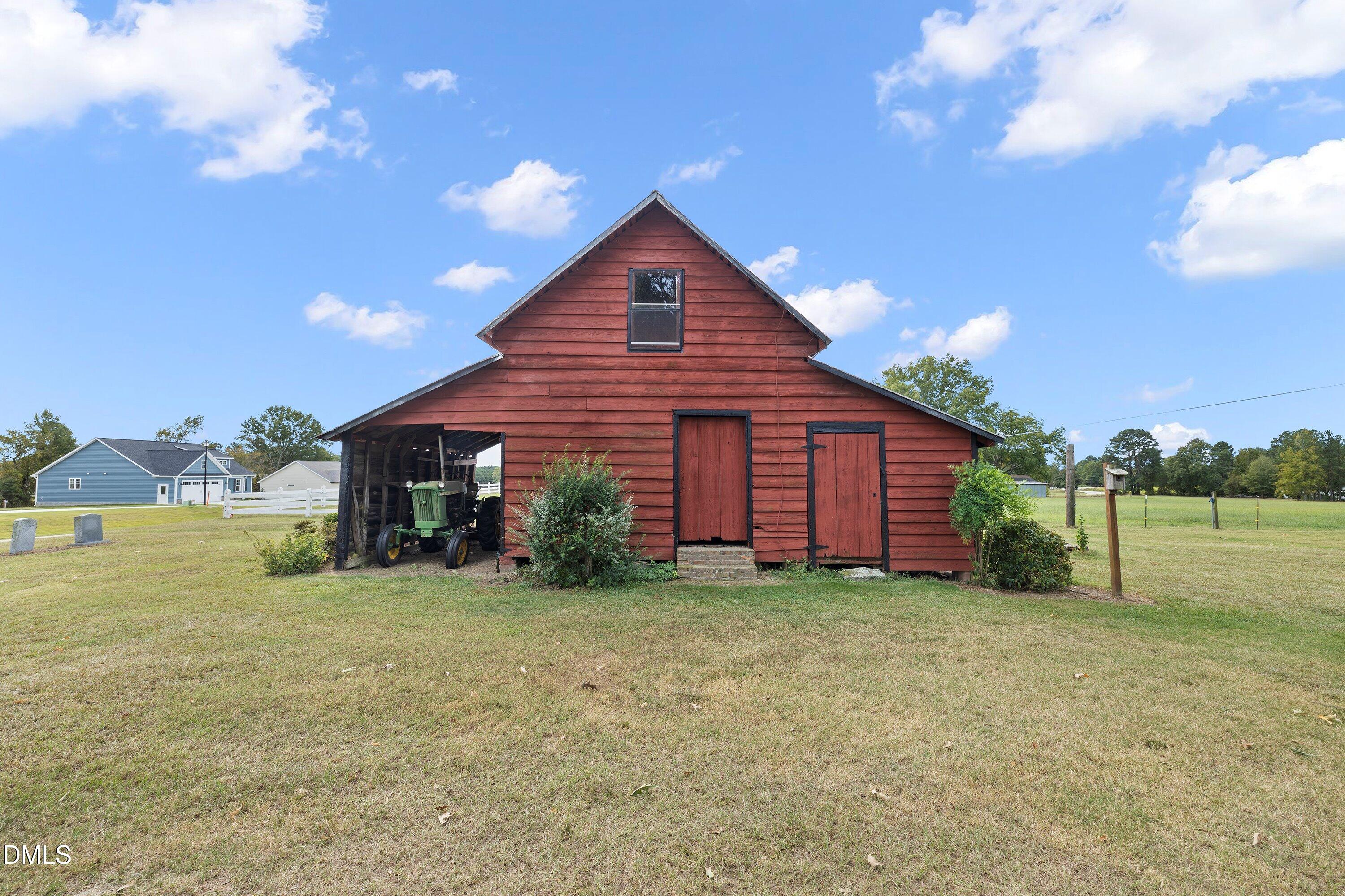 89 Bailey-Boykin Road Selma, NC 27576 - Photo 33 of 48 a view of a house with a yard