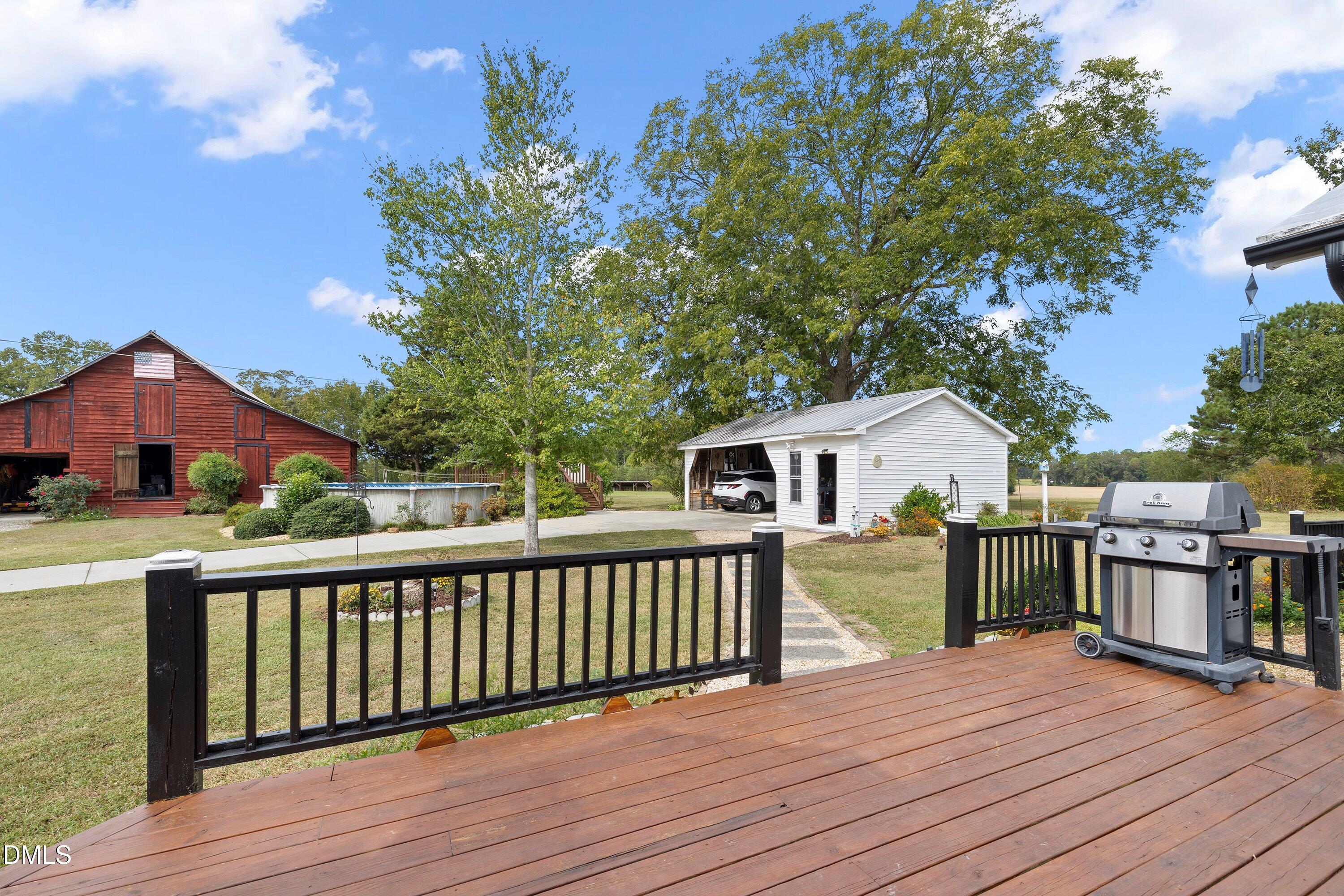 89 Bailey-Boykin Road Selma, NC 27576 - Photo 42 of 48 a view of a house with a deck