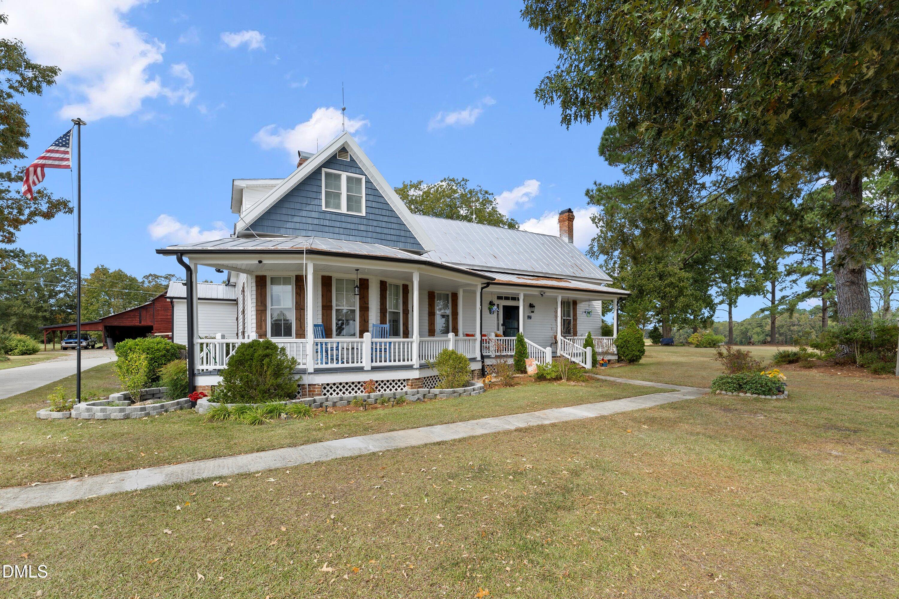 89 Bailey-Boykin Road Selma, NC 27576 - Photo 6 of 48 a front view of a house with a yard