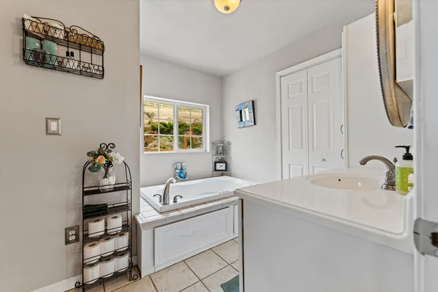 a bathroom with a sink and a bathtub