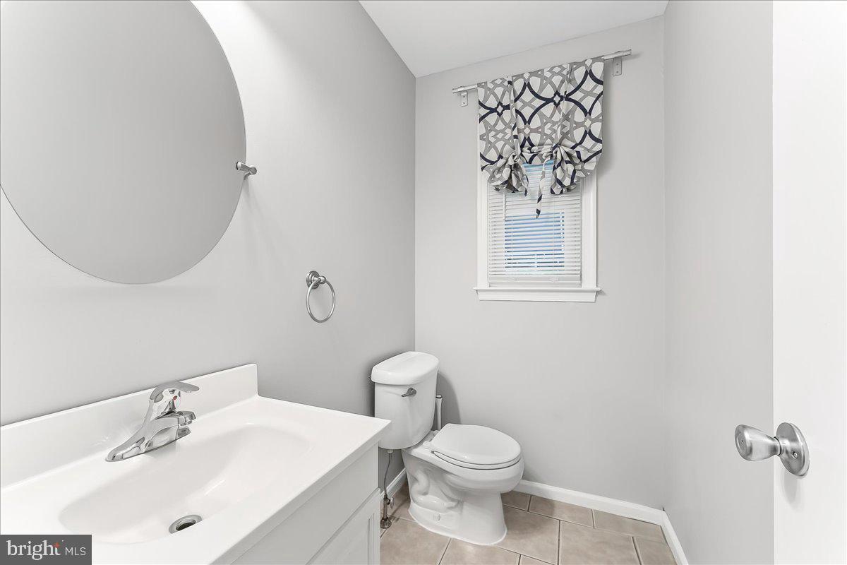 208 Rambling Way Springfield, PA 19064 - Photo 17 of 39 a bathroom with a sink toilet and mirror