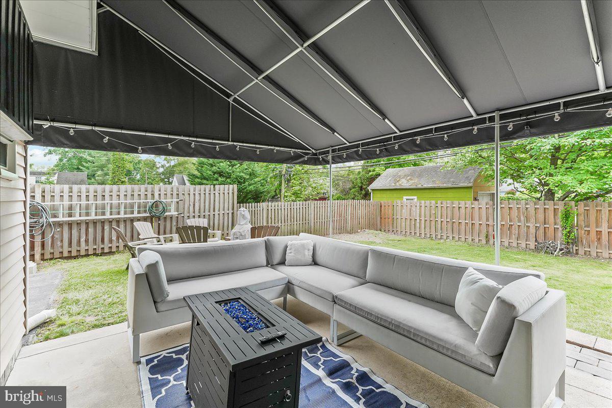 208 Rambling Way Springfield, PA 19064 - Photo 31 of 39 a view of a patio with couches chairs and a table