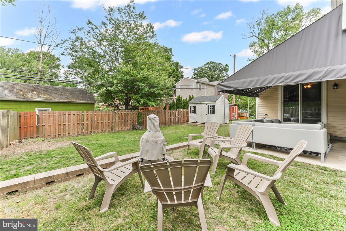 208 Rambling Way Springfield, PA 19064 - Photo 33 of 39 a view of backyard of a house with yard and outdoor seating