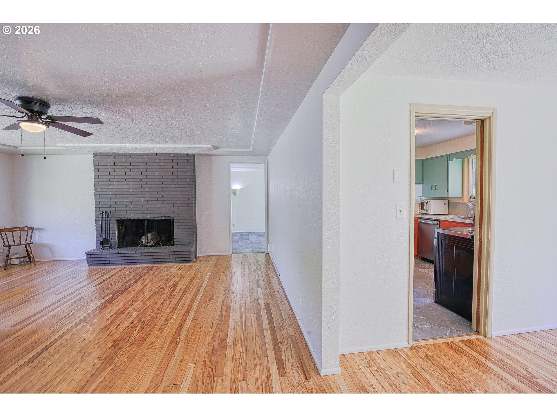 7077 Main Street Springfield, OR 97478 - Photo 5 of 34 a view interior of the house and wooden floor