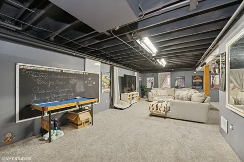 a living room with furniture and a table