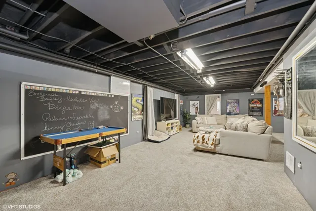 a living room with furniture and a table