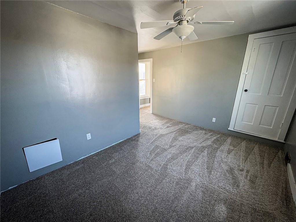 405 2nd Street Butler, PA 16001 - Photo 21 of 24 an empty room with windows and fan