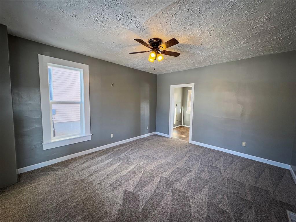405 2nd Street Butler, PA 16001 - Photo 5 of 24 a view of an empty room with a window