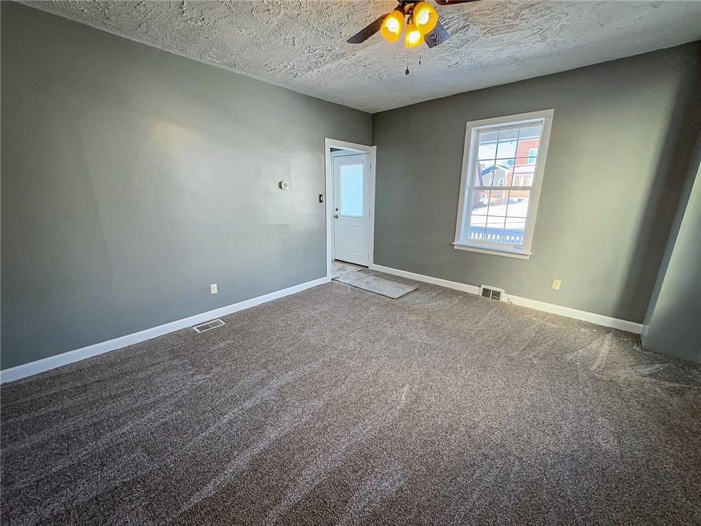 405 2nd Street Butler, PA 16001 - Photo 7 of 24 an empty room with windows