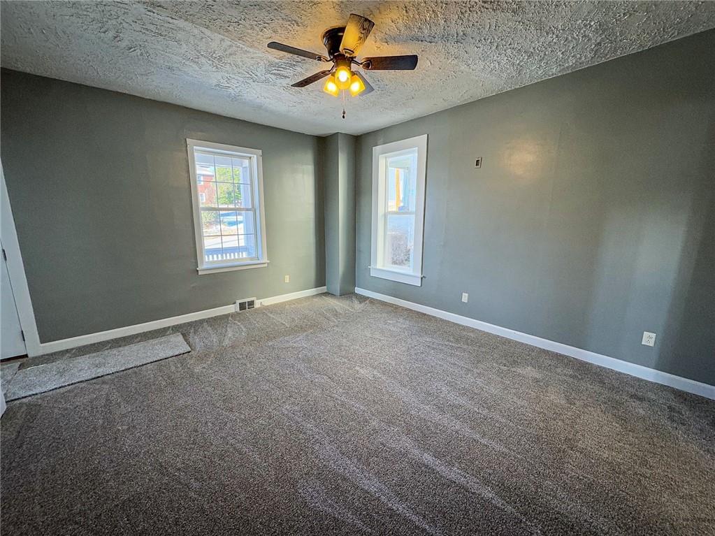 405 2nd Street Butler, PA 16001 - Photo 8 of 24 a view of an empty room with a window