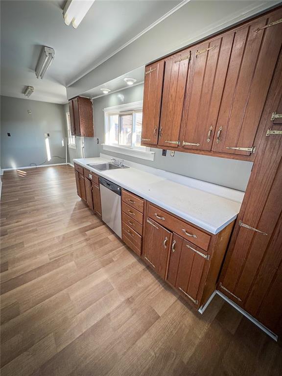 405 2nd Street Butler, PA 16001 - Photo 10 of 24 a kitchen with stainless steel appliances granite countertop wooden cabinets a sink and dishwasher