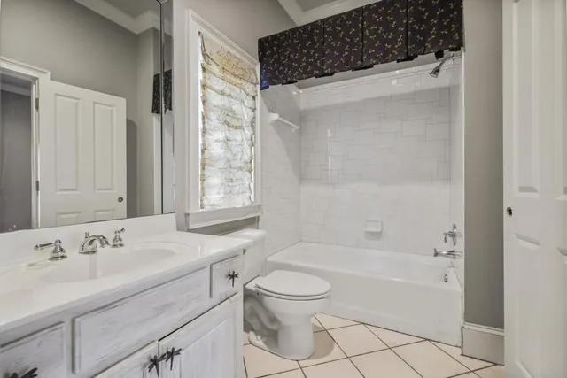 a bathroom with a sink a toilet and a bathtub