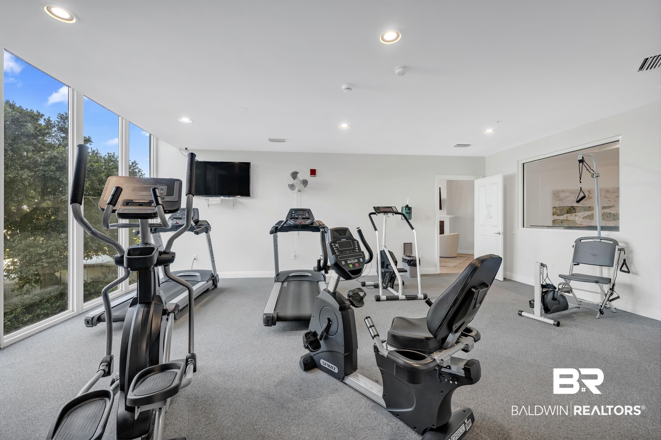 28250 Canal Road, Unit 307 Orange Beach, AL 36561 - Photo 47 of 56 Workout area featuring recessed lighting and expansive windows