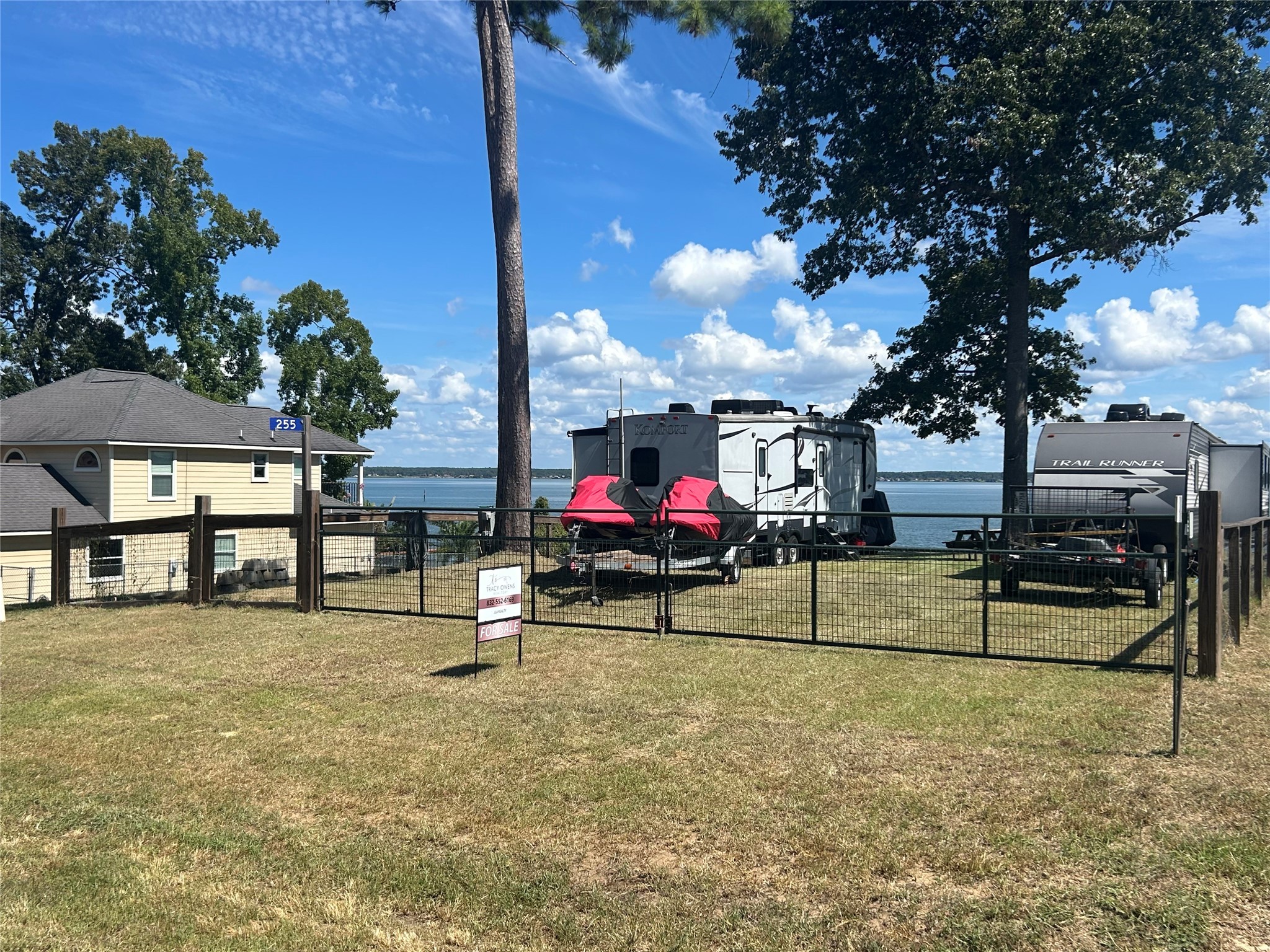 255 Key Largo Loop Point Blank, TX 77364 - Photo 13 of 13 a view of a park with swings