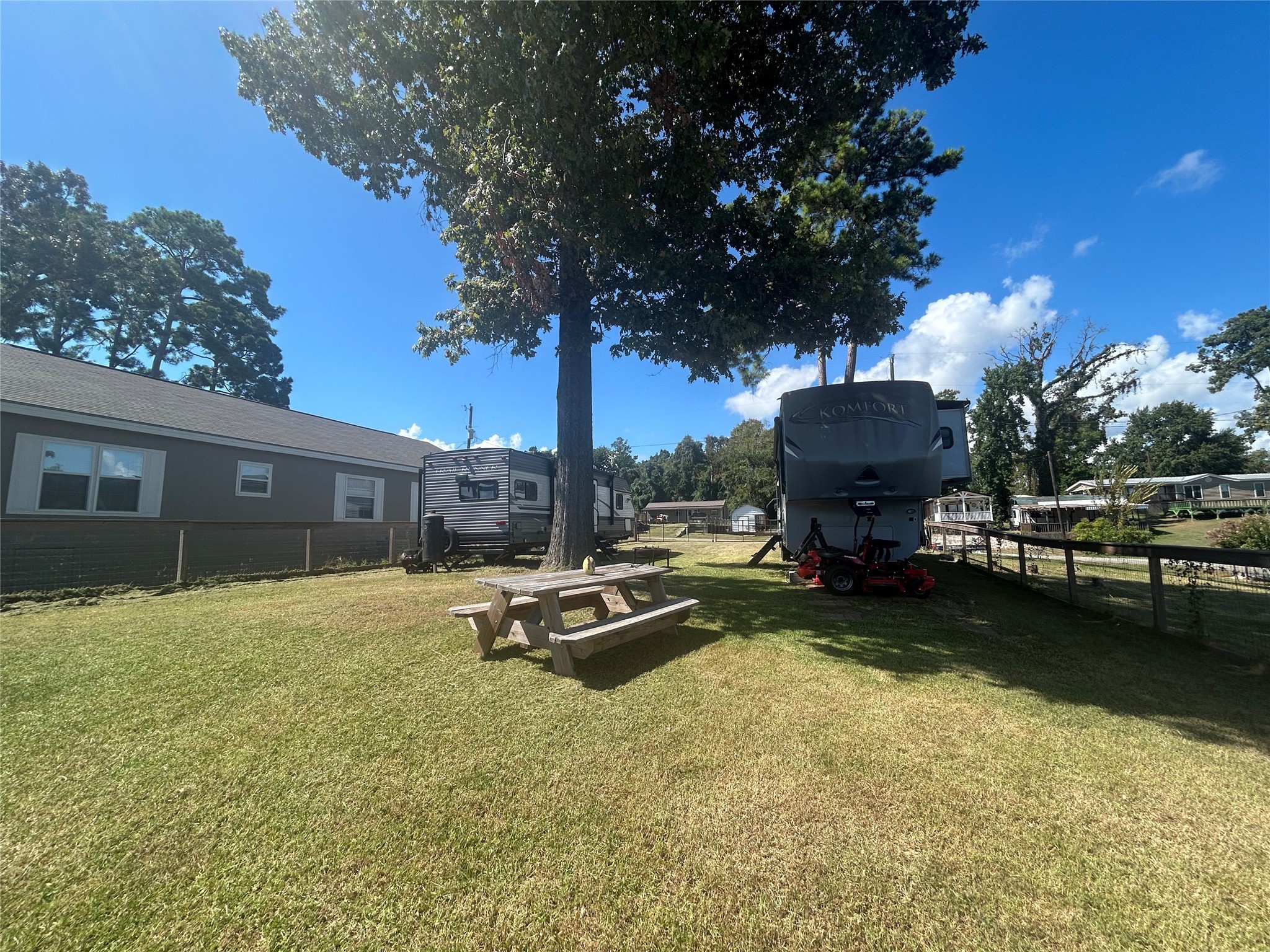 255 Key Largo Loop Point Blank, TX 77364 - Photo 8 of 13 a view of a backyard with furniture