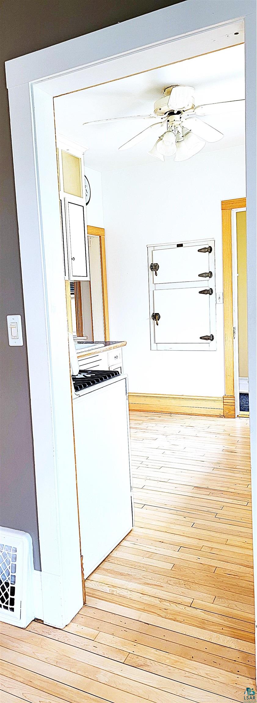 301 Snively Road Duluth, MN 55803 - Photo 8 of 25 Hallway featuring light wood finished floors