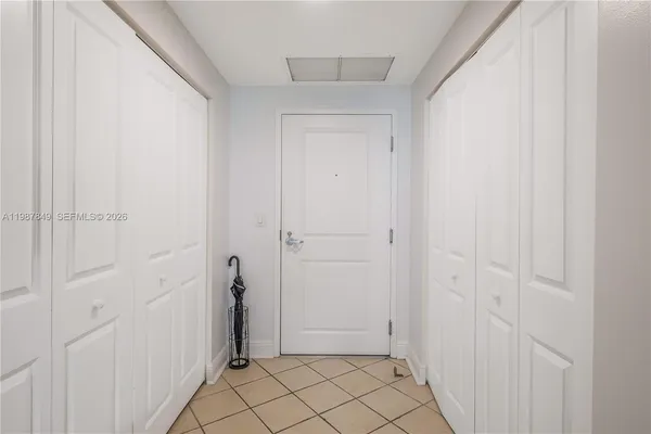 a view of a living room and wooden floor