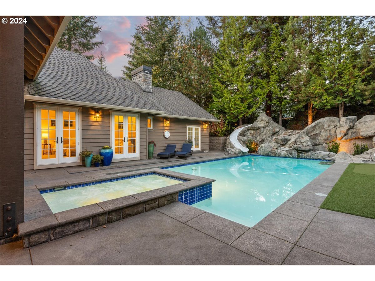 3528 Southwest 64th Place Portland, OR 97221 - Photo 42 of 48 a view of a house with swimming pool and sitting area