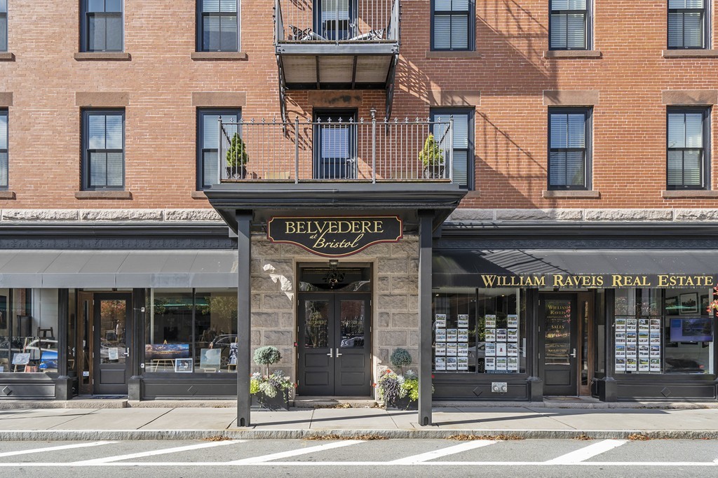 a view of a building on a street