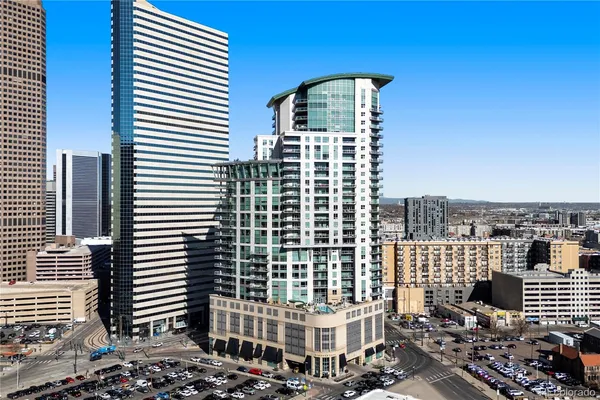 a view of a city with tall buildings