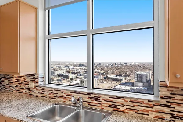 a view of a sink and a window
