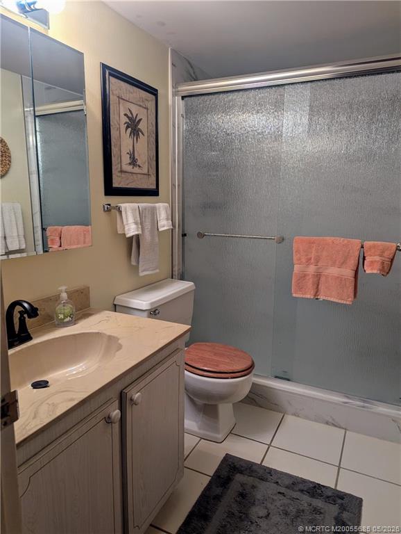 2950 Southeast Ocean Boulevard, Unit 56 Stuart, FL 34996 - Photo 12 of 12 a bathroom with a sink and a toilet