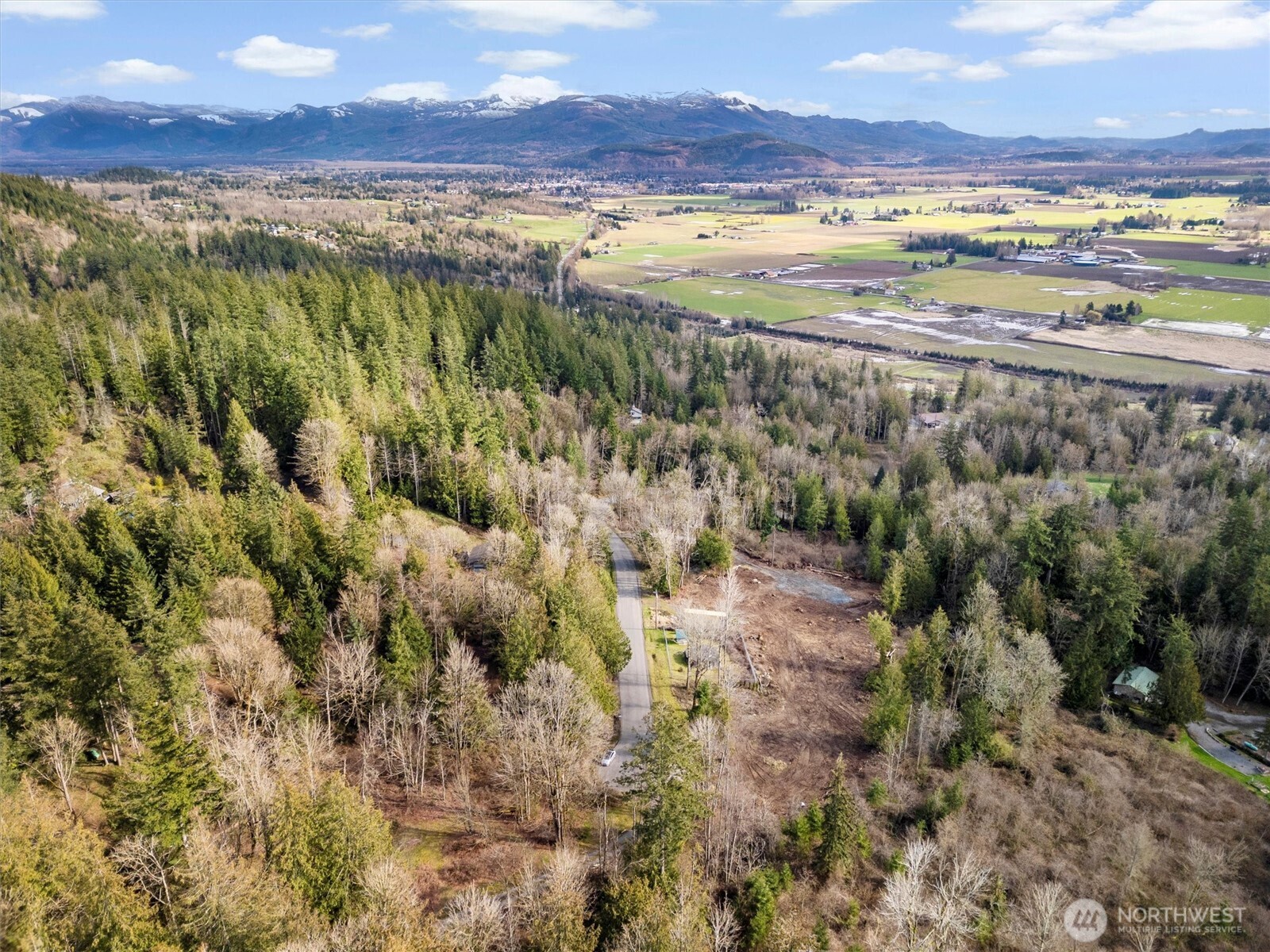 7220 Cliffside Lane Sedro-Woolley, WA 98284 - Photo 1 of 37 a view of an ocean and a mountain