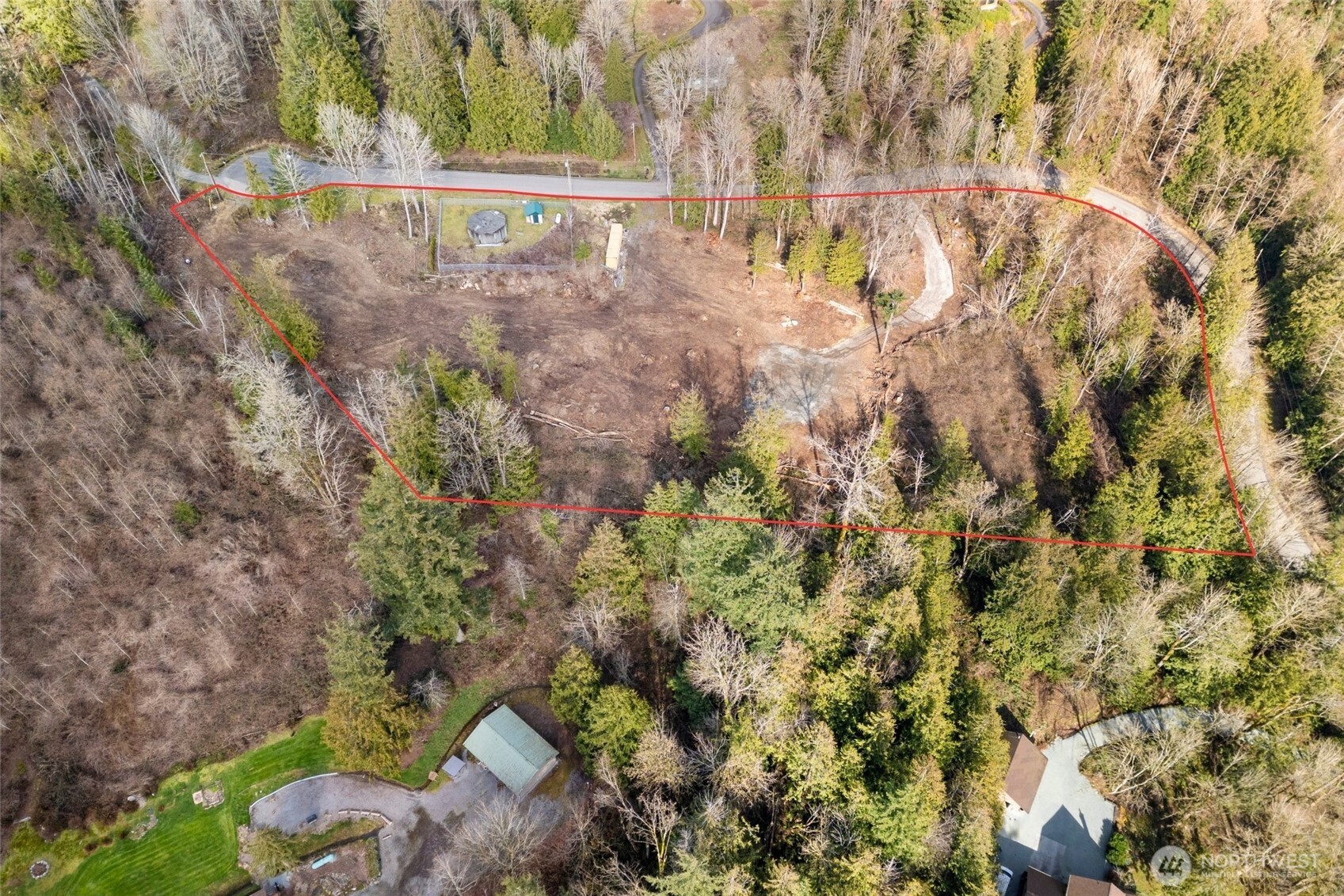 7220 Cliffside Lane Sedro-Woolley, WA 98284 - Photo 3 of 37 a view of a yard with a tree