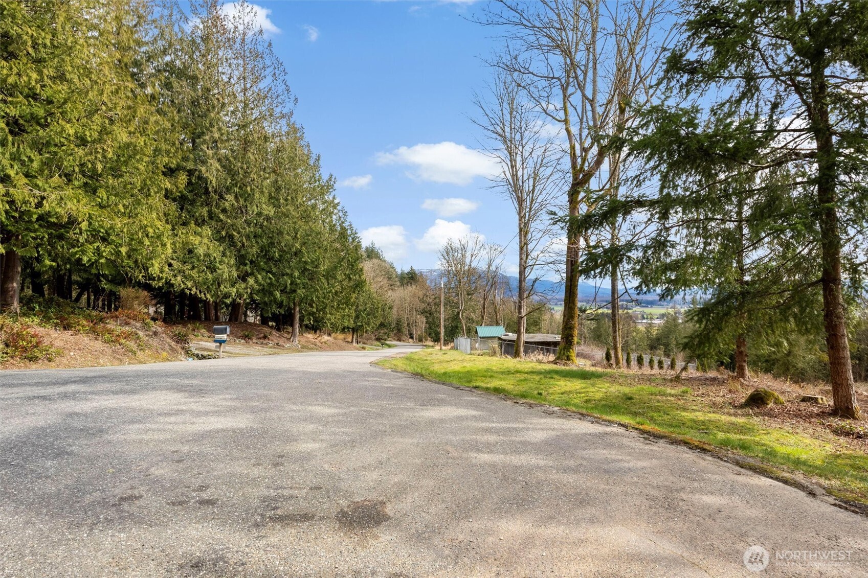 7220 Cliffside Lane Sedro-Woolley, WA 98284 - Photo 7 of 37 a view of a playground with basketball court