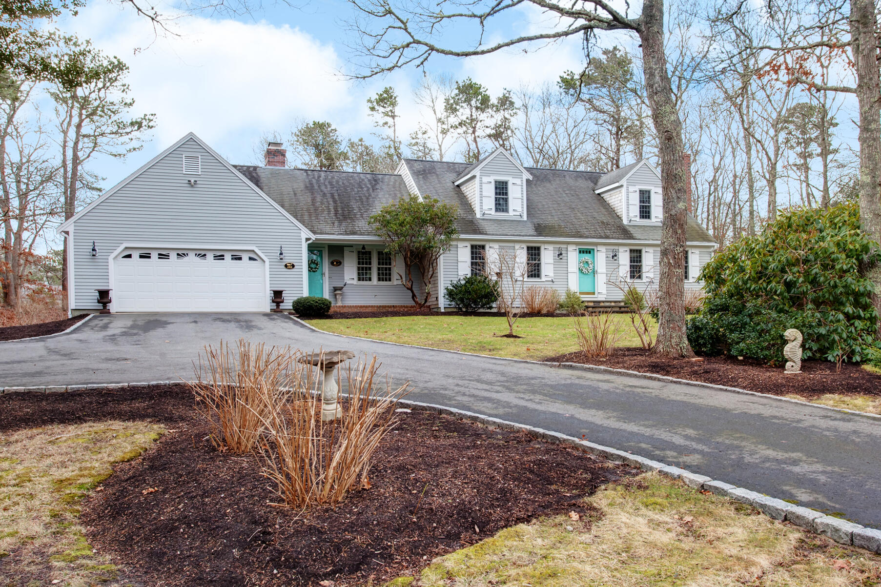 a view of large house with a yard in front of it