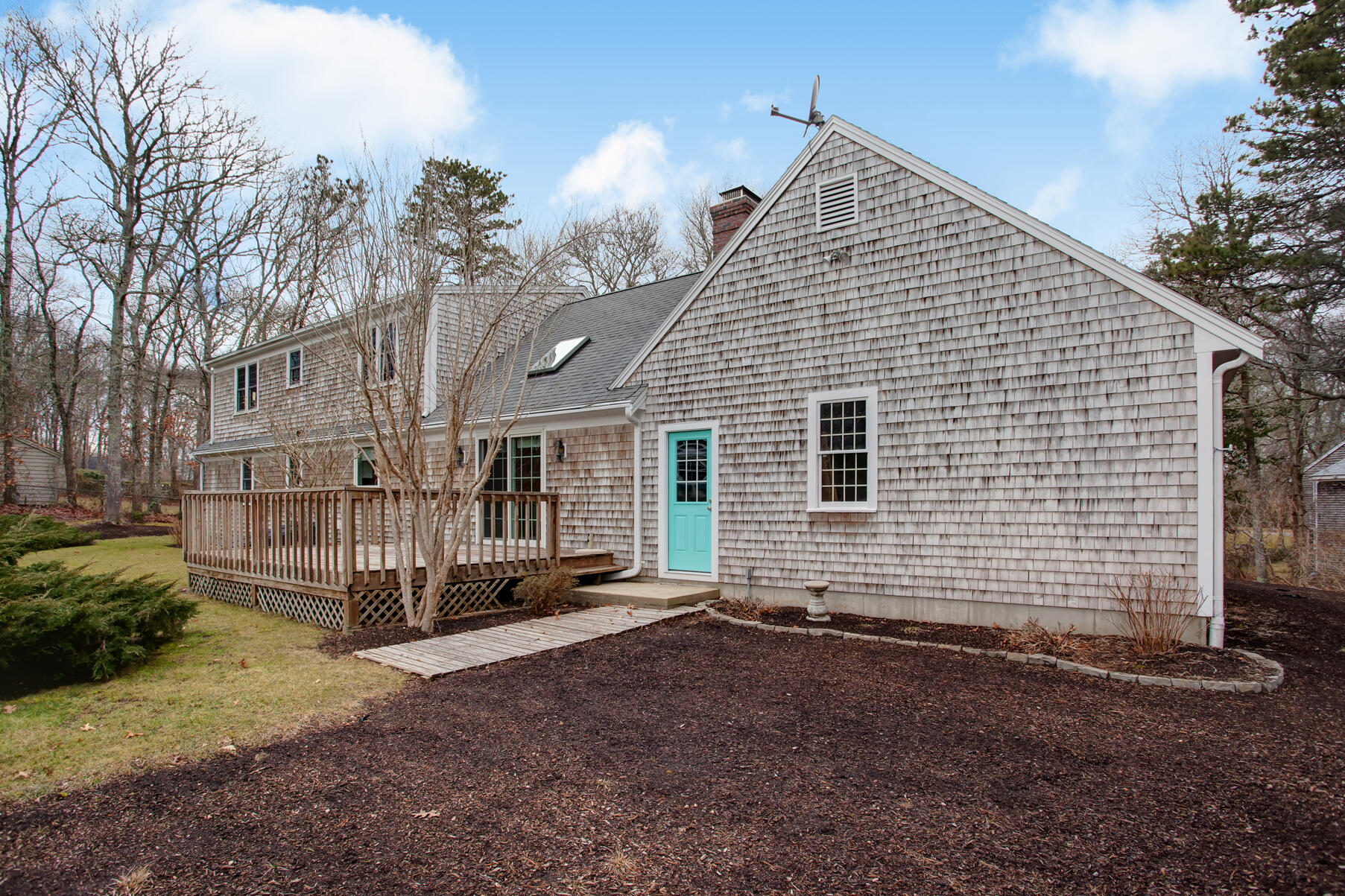 282 Elliott Road Centerville, MA 02632 - Photo 23 of 51 a view of a house with a yard