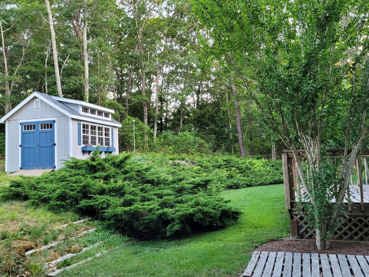 282 Elliott Road Centerville, MA 02632 - Photo 25 of 51 a view of front of house with a yard