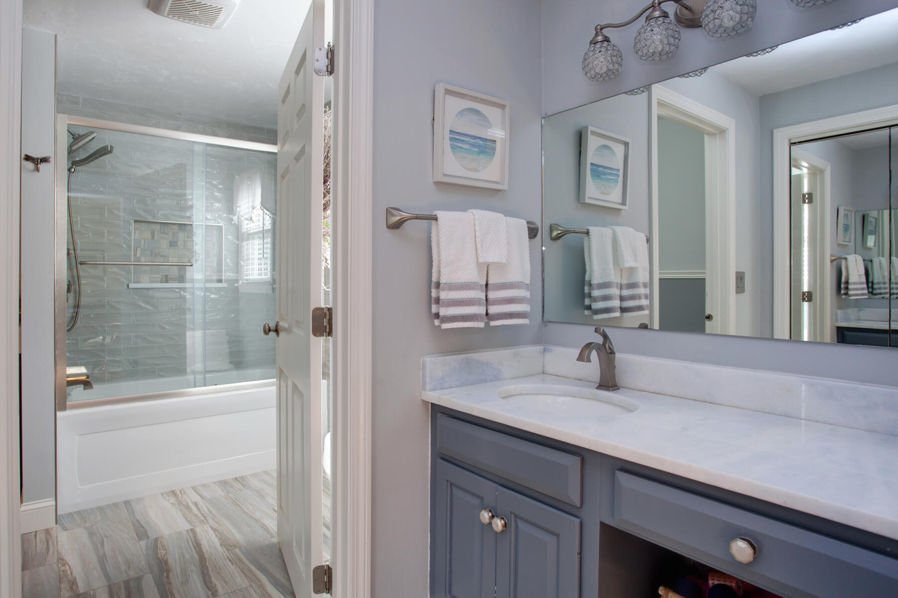 282 Elliott Road Centerville, MA 02632 - Photo 42 of 51 a bathroom with a sink and a mirror