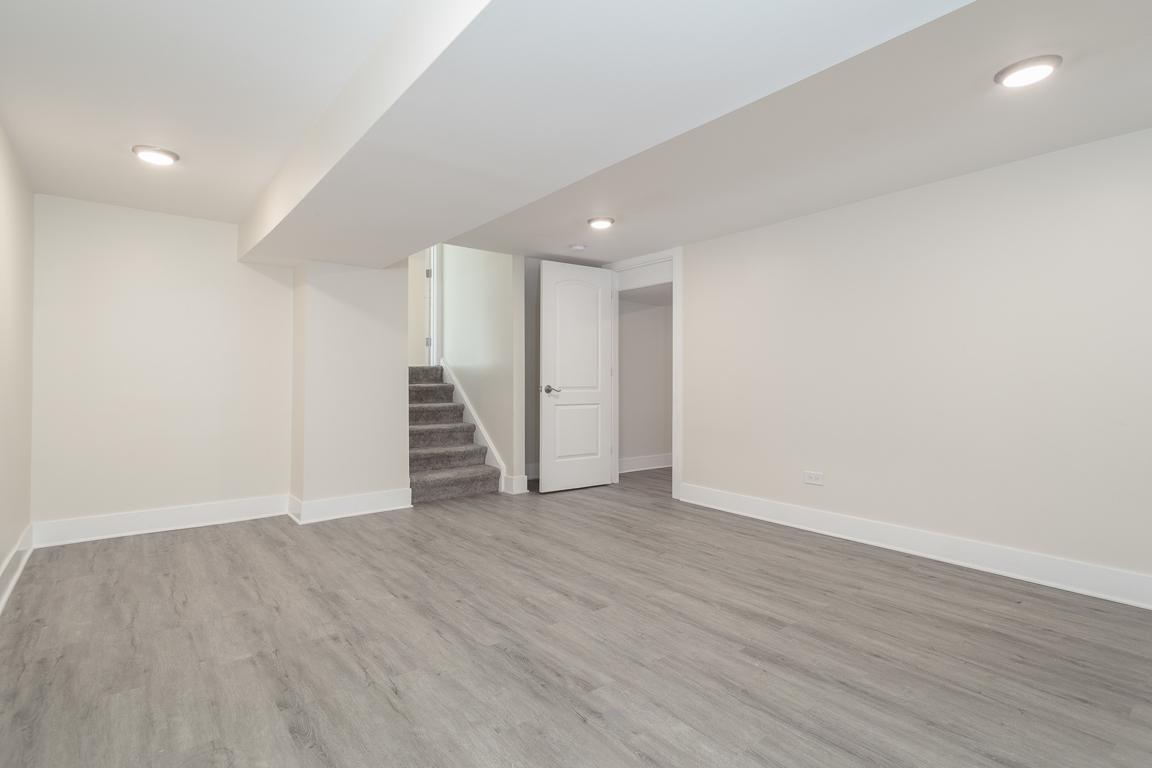 601 Pine Street Deerfield, IL 60015 - Photo 14 of 23 a view of an empty room with wooden floor and stairs