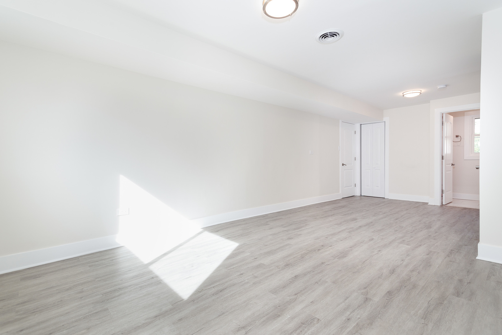 601 Pine Street Deerfield, IL 60015 - Photo 16 of 23 a view of an empty room with wooden floor