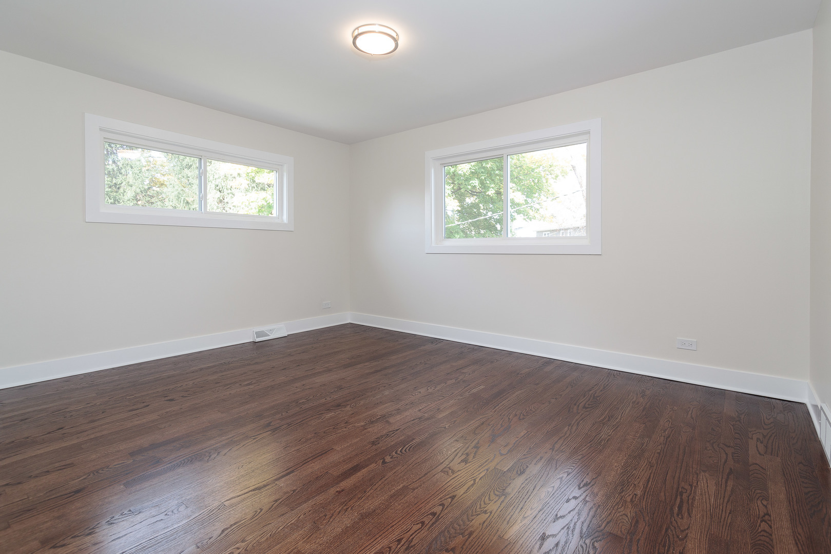 601 Pine Street Deerfield, IL 60015 - Photo 9 of 23 a view of an empty room with wooden floor and a window