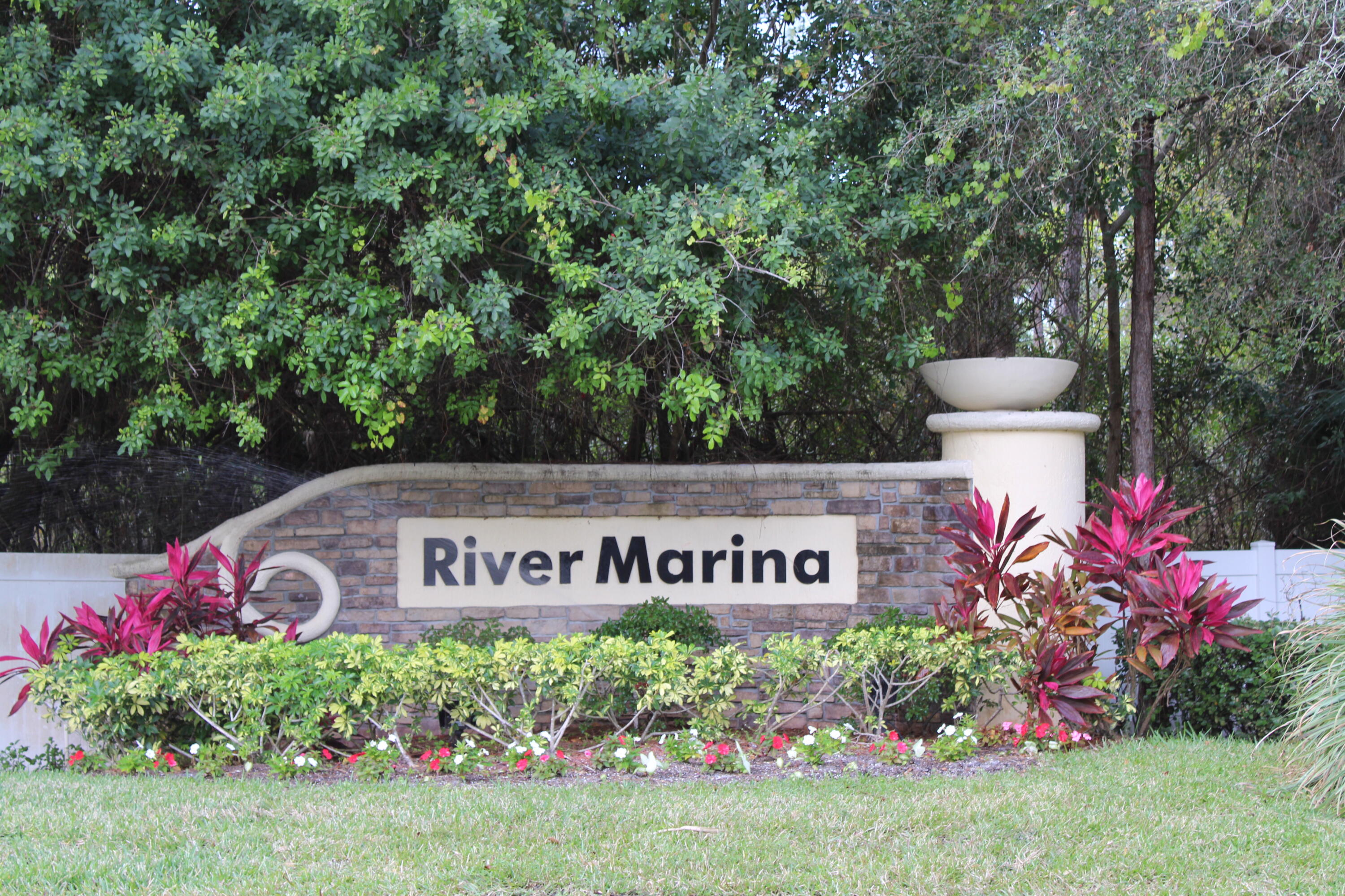 9469 Southwest Purple Martin Way Stuart, FL 34997 - Photo 20 of 23 a view of a sign board