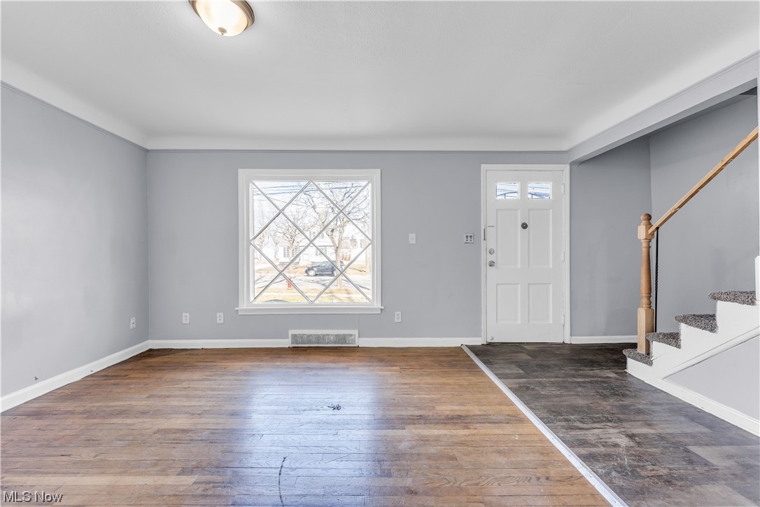 15400 Rockside Road Maple Heights, OH 44137 - Photo 5 of 31 Foyer entrance with dark hardwood / wood-style flooring