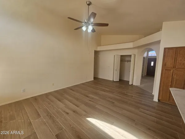 a view of a livingroom with wooden floor