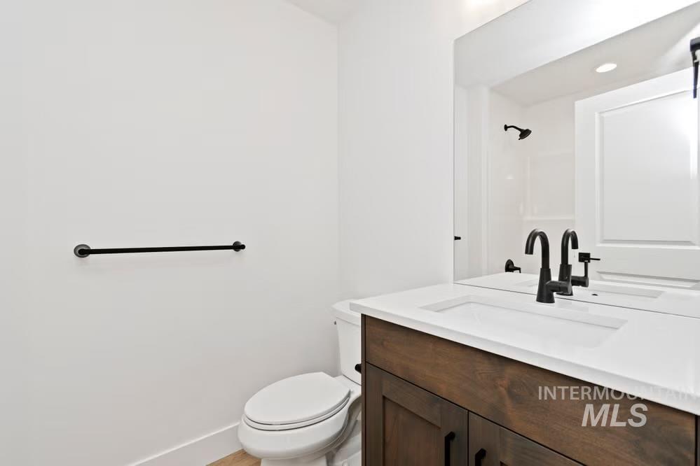 744 South Calhoun Lane Star, ID 83669 - Photo 16 of 34 Bathroom featuring vanity and a shower
