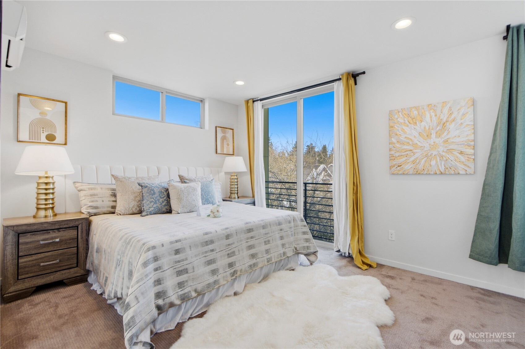 2033 Northwest 65th Street Seattle, WA 98117 - Photo 9 of 20 a bedroom with a large bed and a window