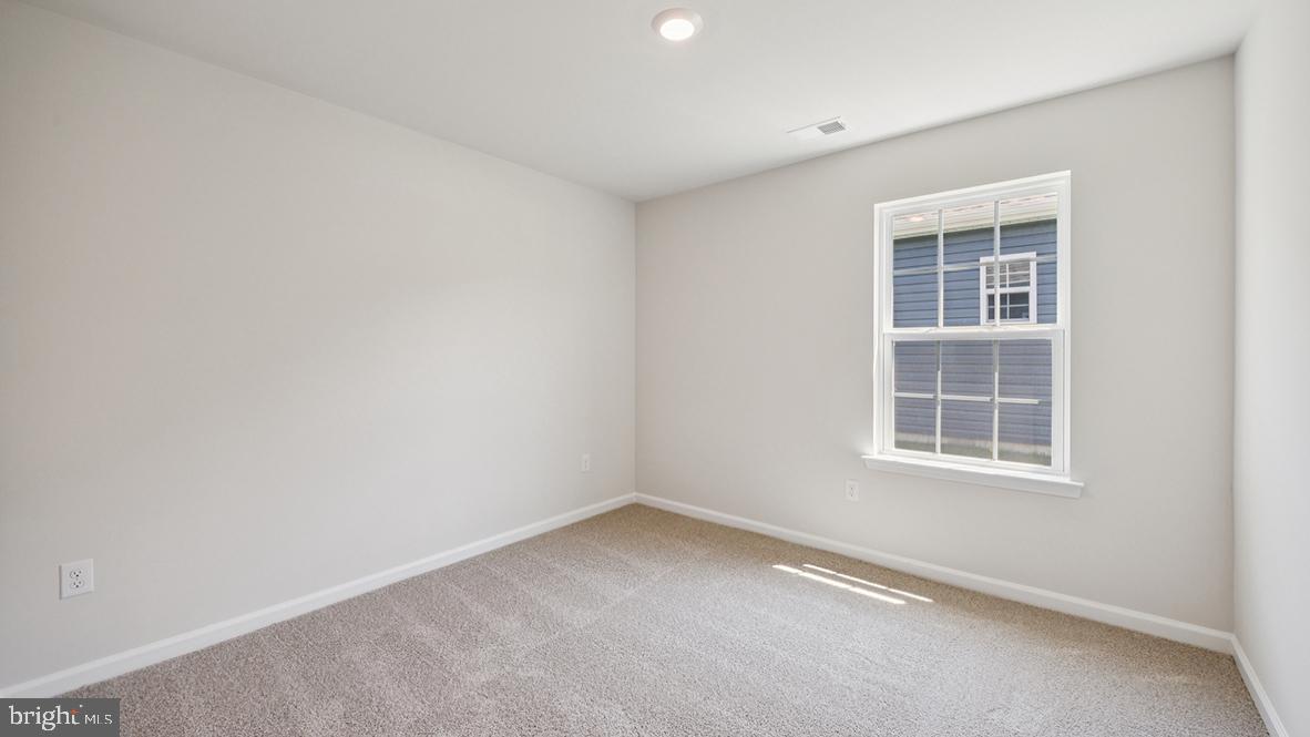 311 Vero Road Egg Harbor Township, NJ 08234 - Photo 11 of 27 an empty room with a window