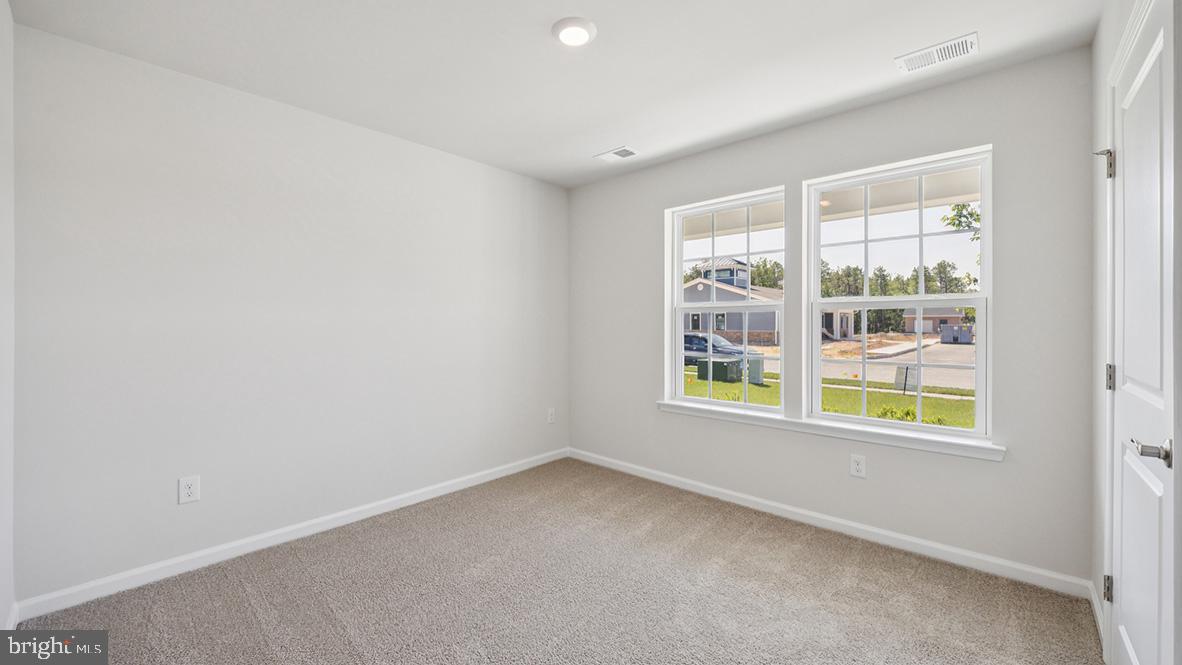 311 Vero Road Egg Harbor Township, NJ 08234 - Photo 20 of 27 an empty room with a window
