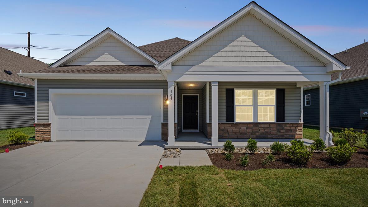 311 Vero Road Egg Harbor Township, NJ 08234 - Photo 2 of 27 a front view of a house with garden